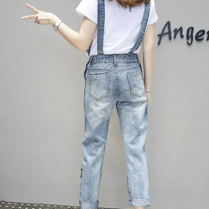 ผู้หญิงการ์ตูนเย็บปักถักร้อย Sequined ขากว้างหลวม Ripped DENIM Overalls ยุโรป Jumpsuit Boyfriend Hole กางเกงยีนส์ Romper