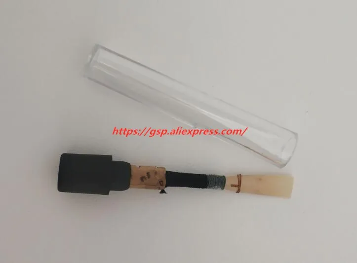 

Oboe Reed, natural Reed material, red and black wind instrument whistle piece