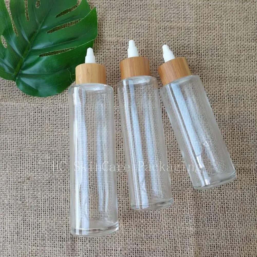 Empty Custom Logo Skin Care Containers Packaging Clear Glass Bottles Jar with Bamboo Glue Lid Shampoo Lotion Toner Lid  Bottles