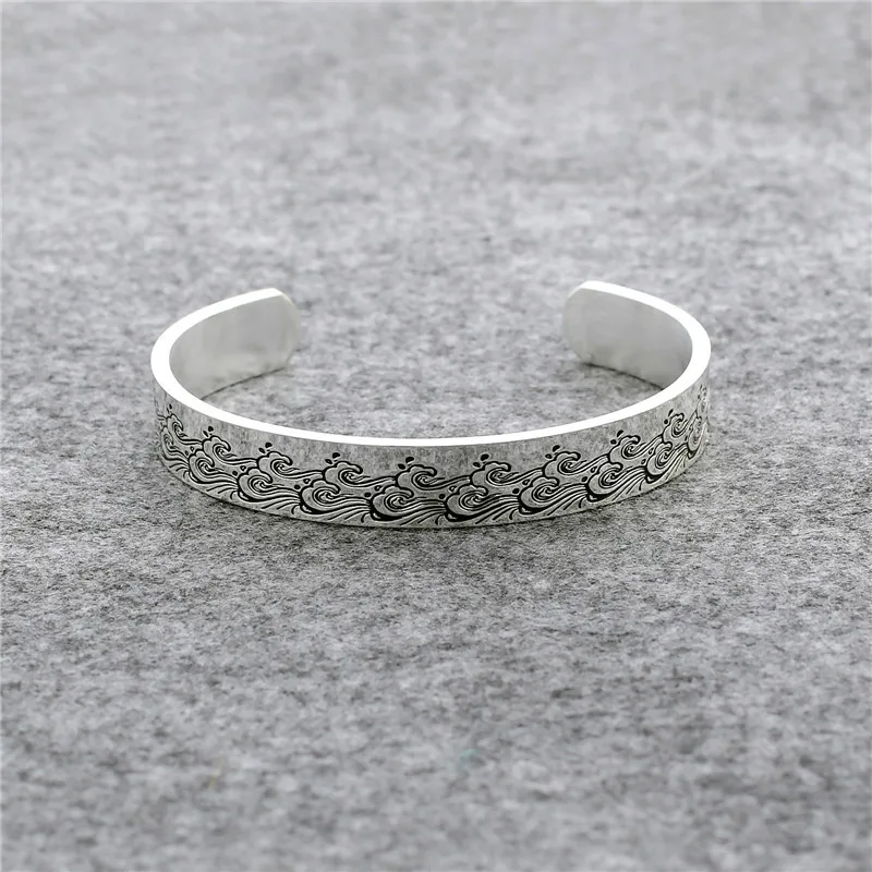 Hot wave pattern lettering Fate whispers to the warrior inspirational titanium steel bracelet