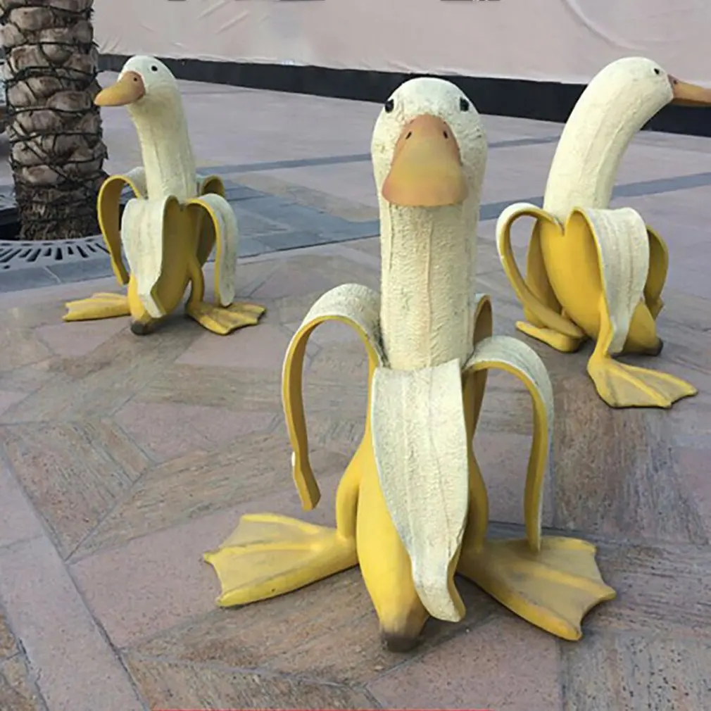 

Garden Statue Creative Banana Duck Statue Yard Art Peeled Banana Figurine For Outdoor Decor Desktop Ornaments Garden Accessories