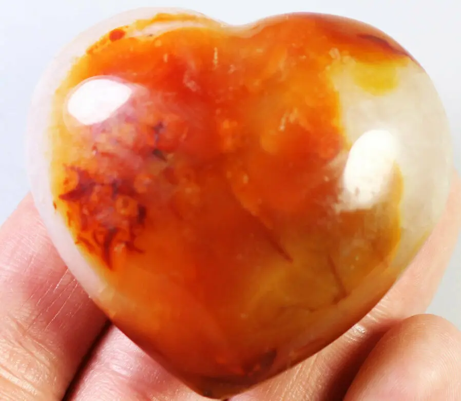 Natural red orange agate crystal polished heart palm stone