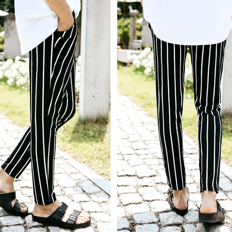 Spring and autumn personality Slim vertical stripes tide male hairdresser stage equipment Harem pants feet pants casual nine poi