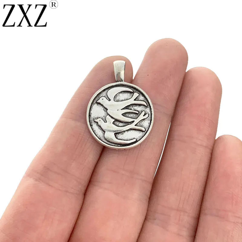 

ZXZ 20pcs Antique Silver Carved Bird Swallows Round Circle Charms Pendants for Jewellery Necklace Earrings Making 20mm