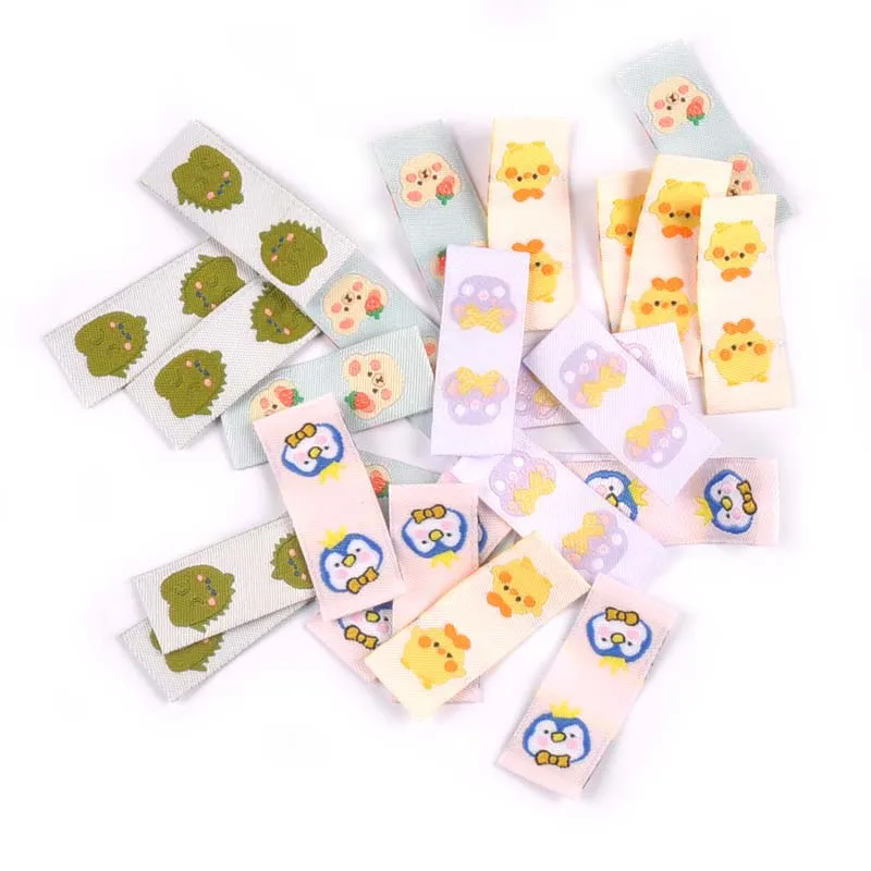 50Pcs Cartoon Dinosaur/Penguin Labels For Shoes Care Bags Sewing Garment Handmade Accessories DIY Crafts Fabric Clothing Tags