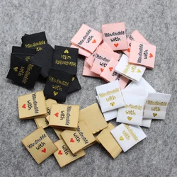 100 pcs handmade labels in stock/golden labels/clothing customized woven labels/tags/garment embroidered tags