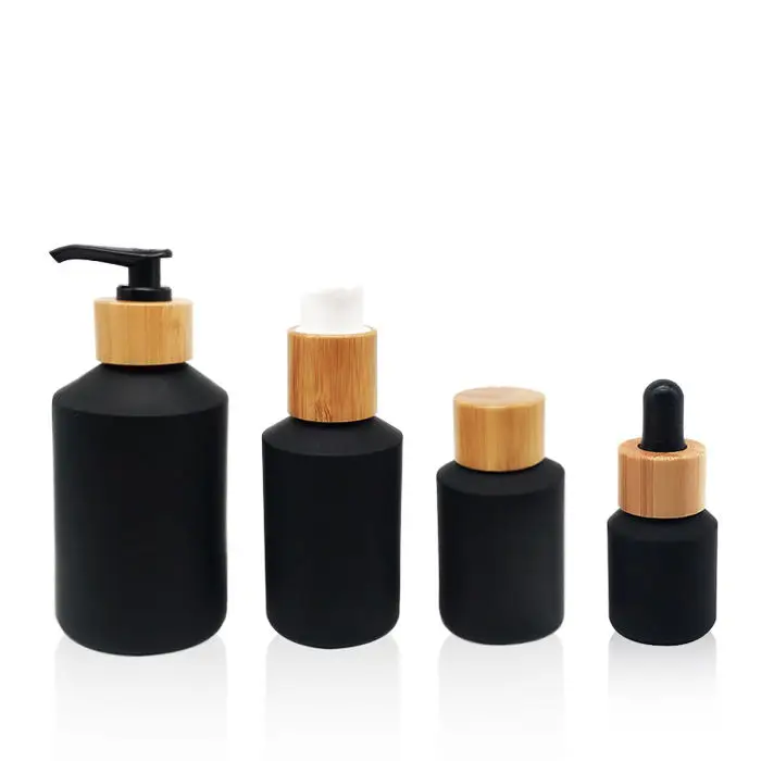 

10pcs 60ml cosmetic wooden lid glass cream lotion bottle glass black frosted pump bottle with pure nature bamboo shampoo cap