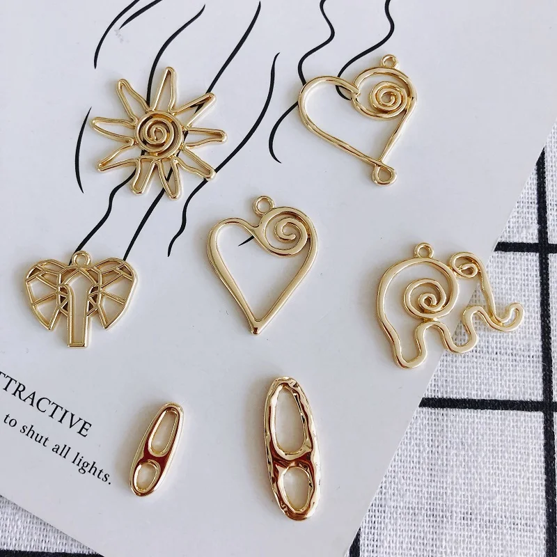 

DIY alloy plating jewelry accessories wholesale abstract elephant sun flower heart-shaped pendant earrings material accessories