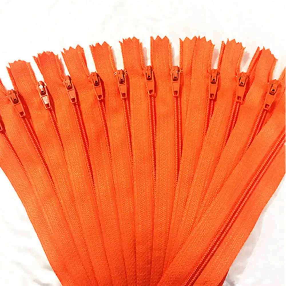 

10 pieces. 60cm (24inch) nylon coil, zipper, tailor, crafter and fgdqrs Orange