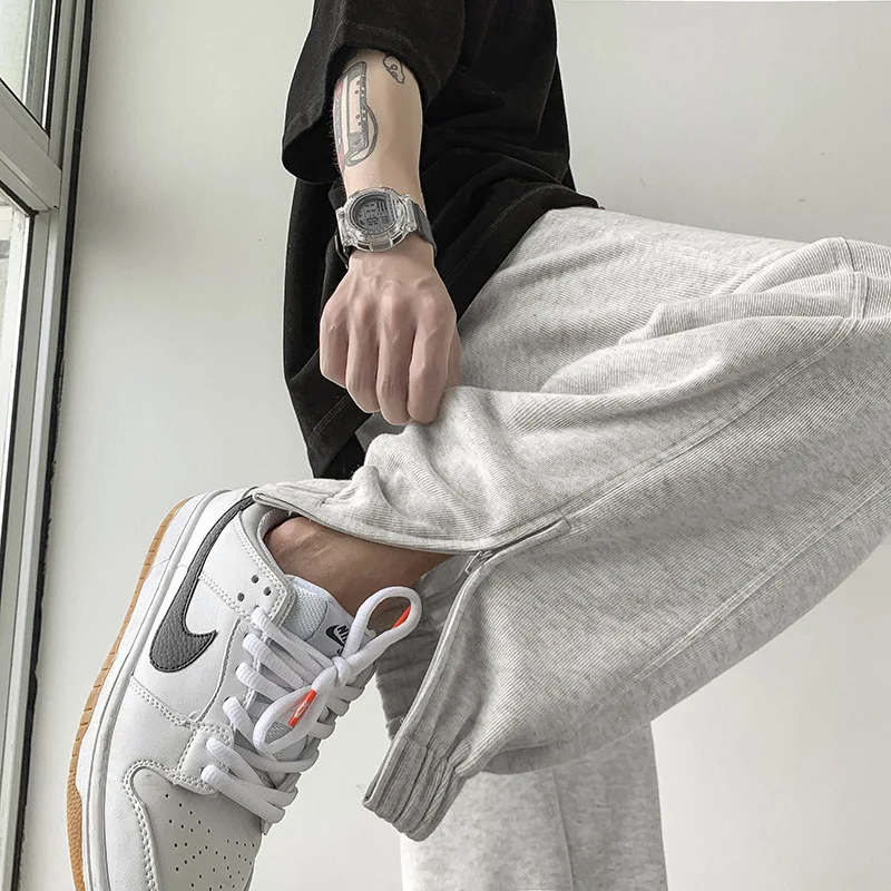 

2021 new sweatpants male Japanese department ins all-match simple leg zipper design pendant sense pants sports slacks
