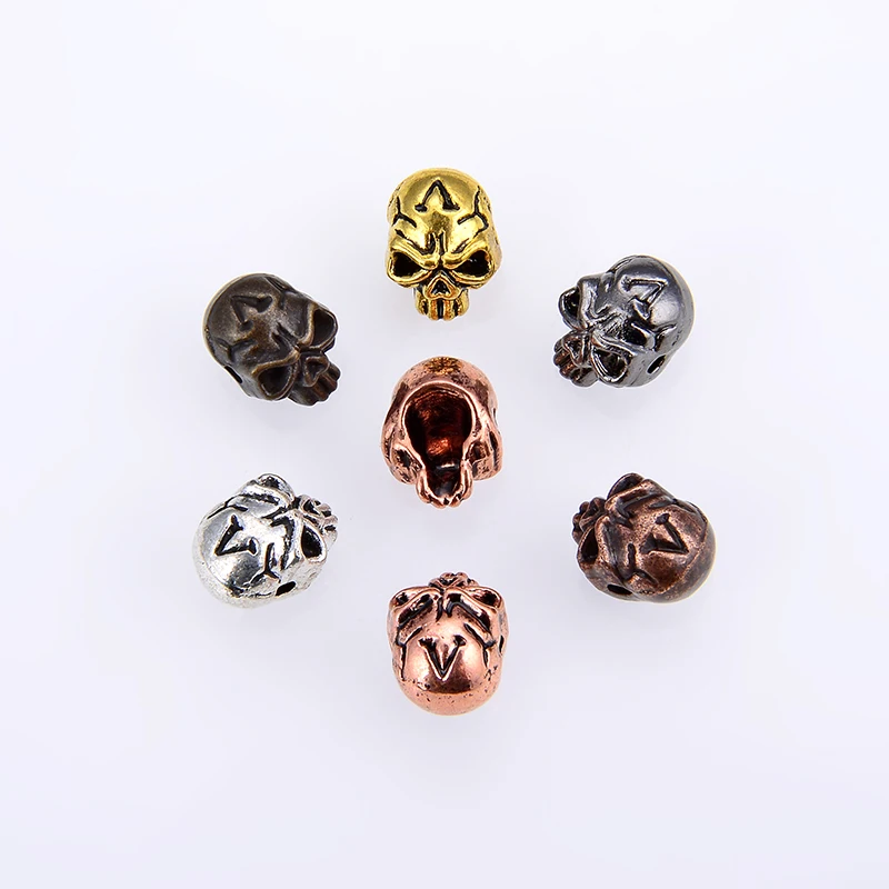 10PCS / zinc alloy material skull perforated beads specification length 12mm width 9mm hole 1.5mm can be equipped with DIY bead