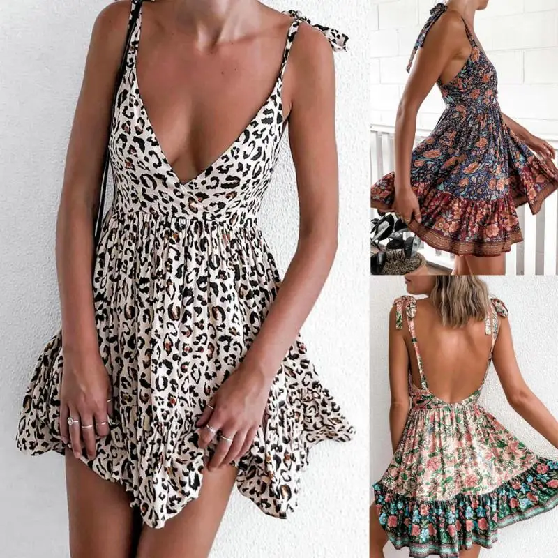 Summer women's dress sexy sexy sling low-cut V-neck print holiday beach sunscreen dress