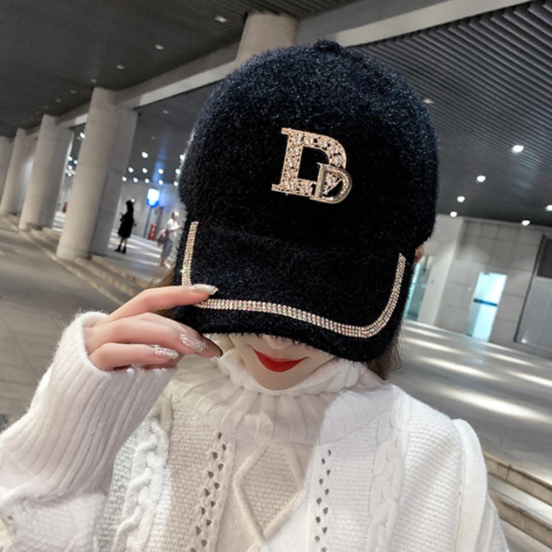 

Winter baseball cap women version of Faux fur cap winter Faux seahorse hair Warm Cap For Women Rhinestone D Letter Visor Hats