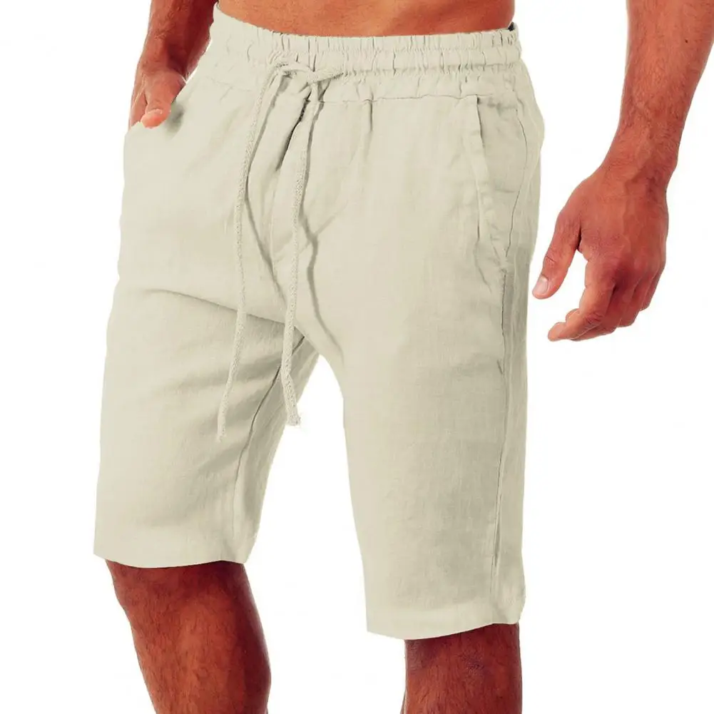 Short de sport pour hommes, couleur unie, longueur genou, cordon de serrage, deux poches d'entraînement, Streetwear