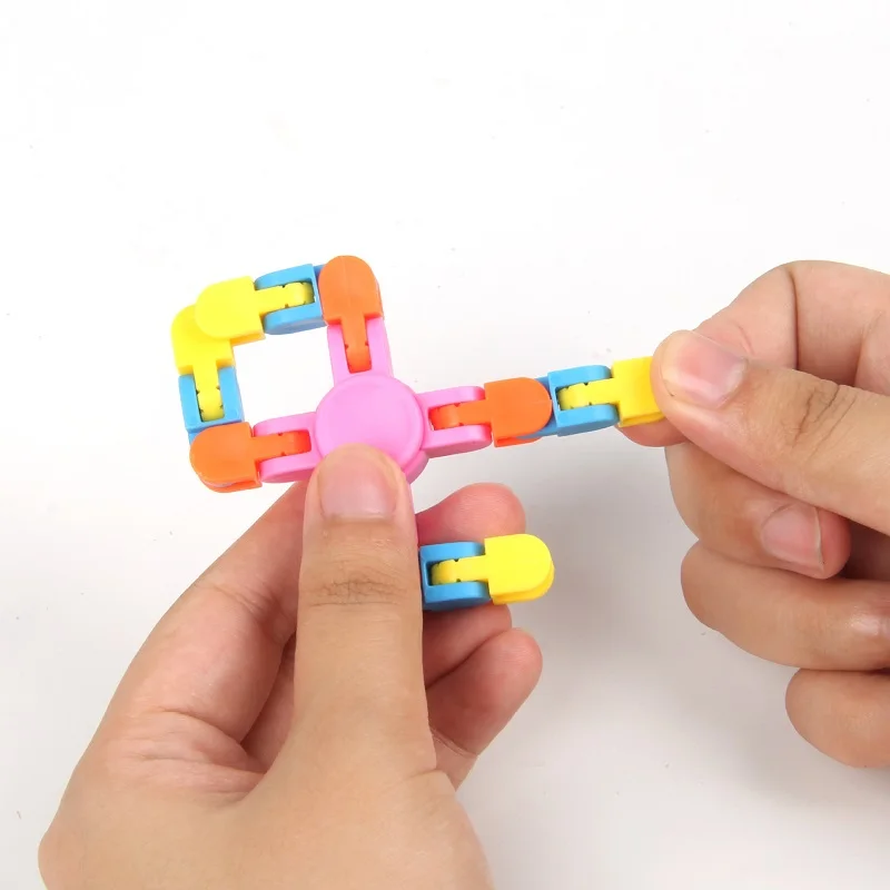 Cadena giroscópica para la yema del dedo, juego de bloques de construcción, Spinner, estación de entrenamiento y guía, regalo