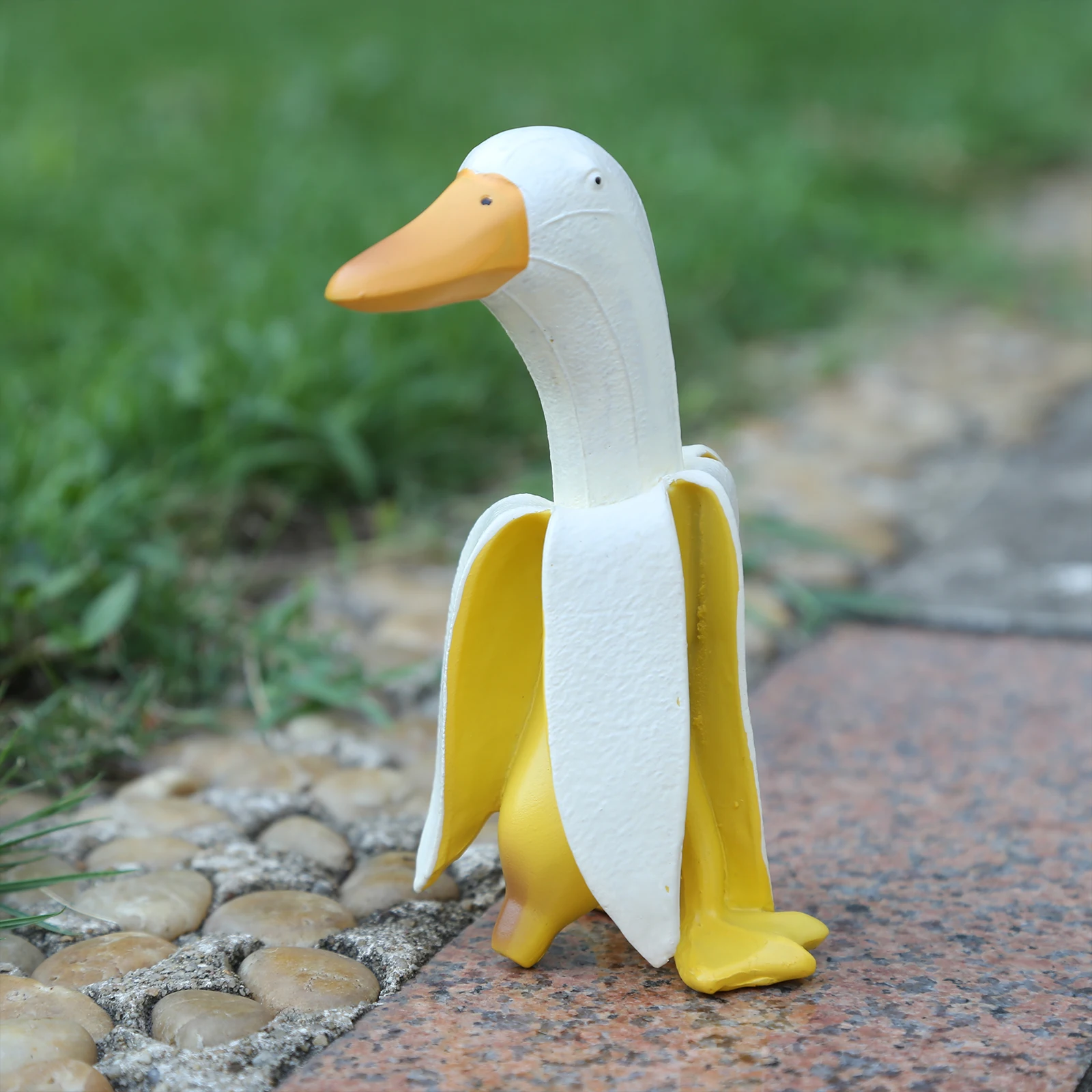 Statua di arte di anatra di Banana, arredamento esterno da giardino, simpatici ornamenti di decorazione di figurine di anatra di Banana pelati divertenti divertenti