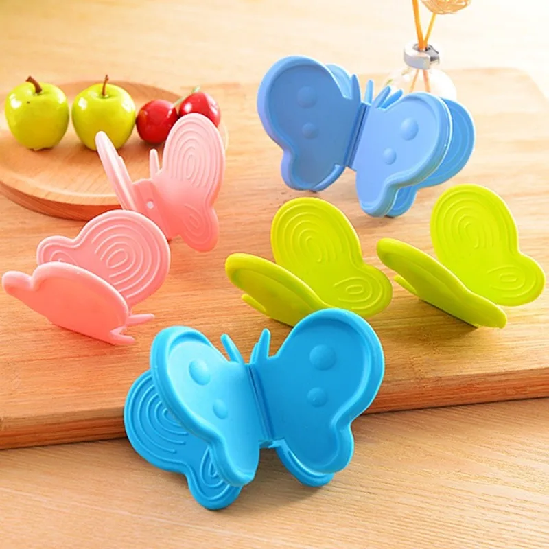 Manopla de silicona con forma de mariposa para horno, herramienta de cocina con Clip, aislamiento térmico, antideslizante, placa, soporte para olla, 1 unidad