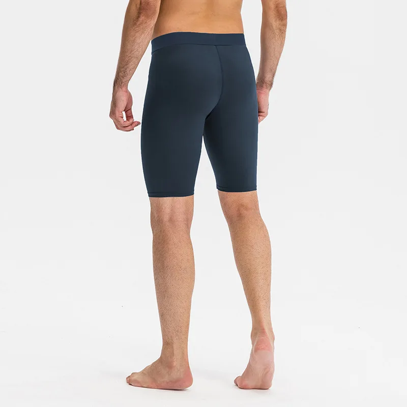 Pantalones cortos de compresión con bolsillo para teléfono para hombre, mallas deportivas de secado rápido para gimnasio y Fitness, ropa interior de