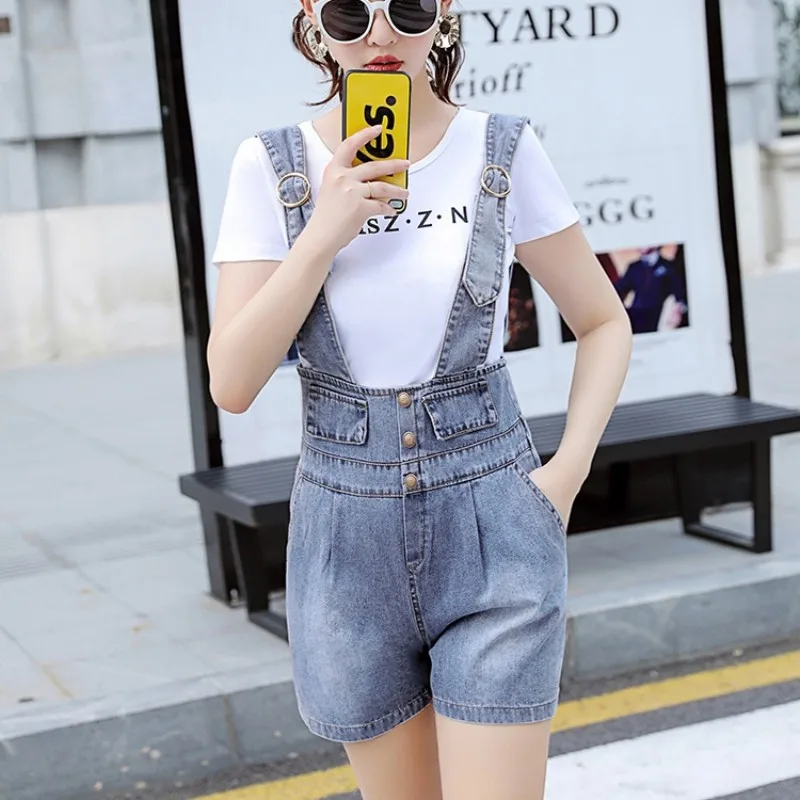 Nowe koreańskie Denim Playsuits kobiety luźny krój wysokiej talii szerokie nogawki krótkie kombinezony damskie Casual pojedyncze piersi dżinsy ubrania