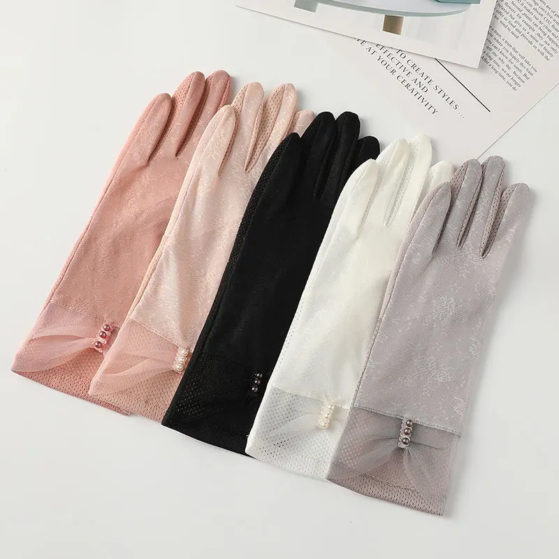 Gants de protection solaire en dentelle pour femmes, gants d'été sexy, glace, écran tactile antidérapant, respirant, fin, mi-long, élégant, perle, nœud de fleur, TK31