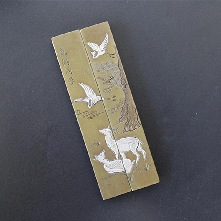 

The "scholar's four jewels" paper weight paper pressing copper brass with the spring deer Crane Paperweight.