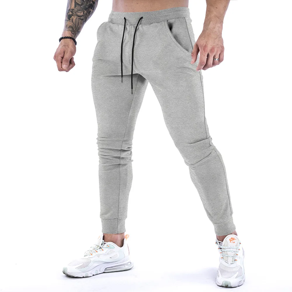 2021 new muscle fitness running training sports cotton trousers men's breathable Slim beam mouth casual health pants