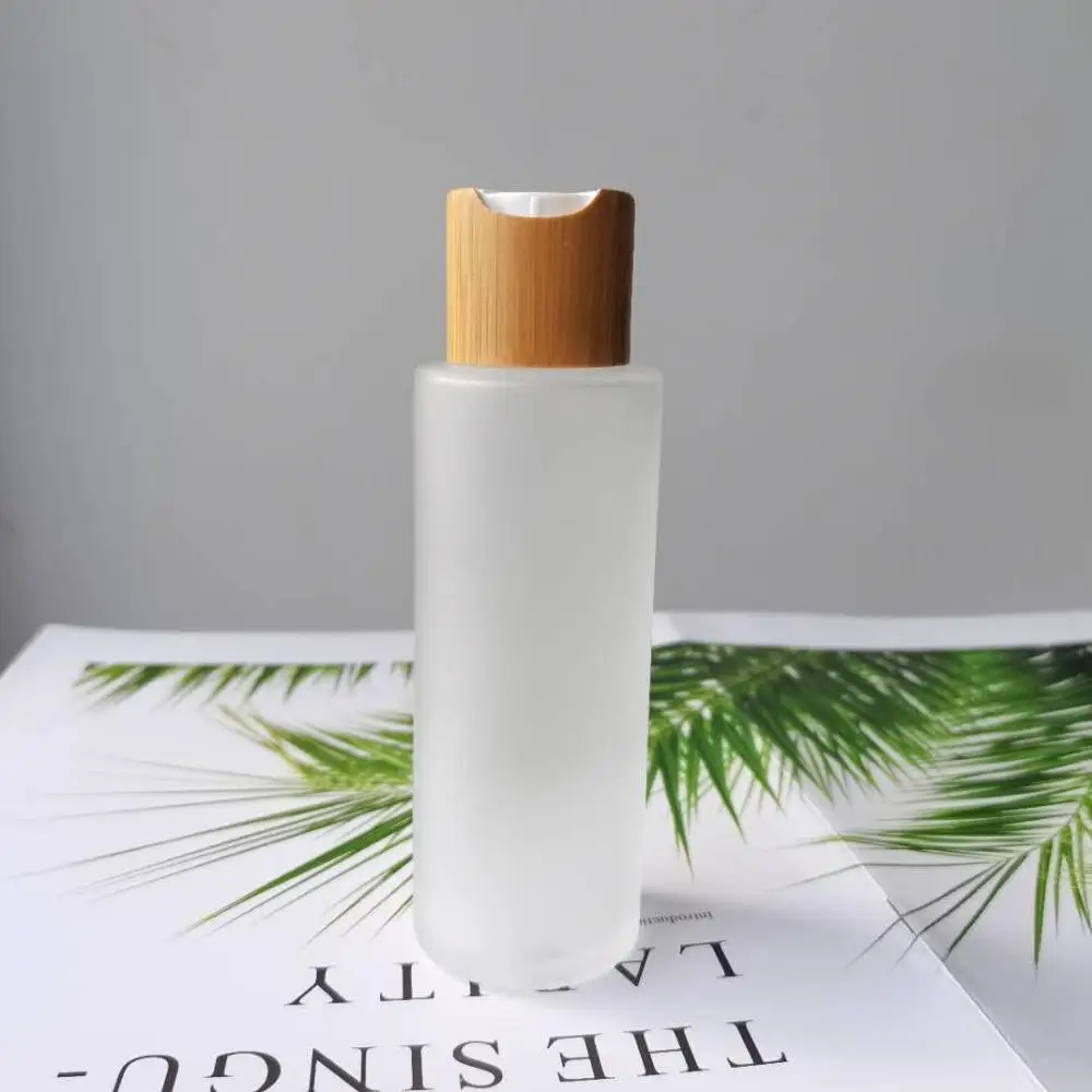 

50pcs 30ml 50ml Frosted Glass Lotion Atomizer Bottles with Eco-friendly Bamboo Lid Fine Mist Spray Pump Dispenser For Perfume