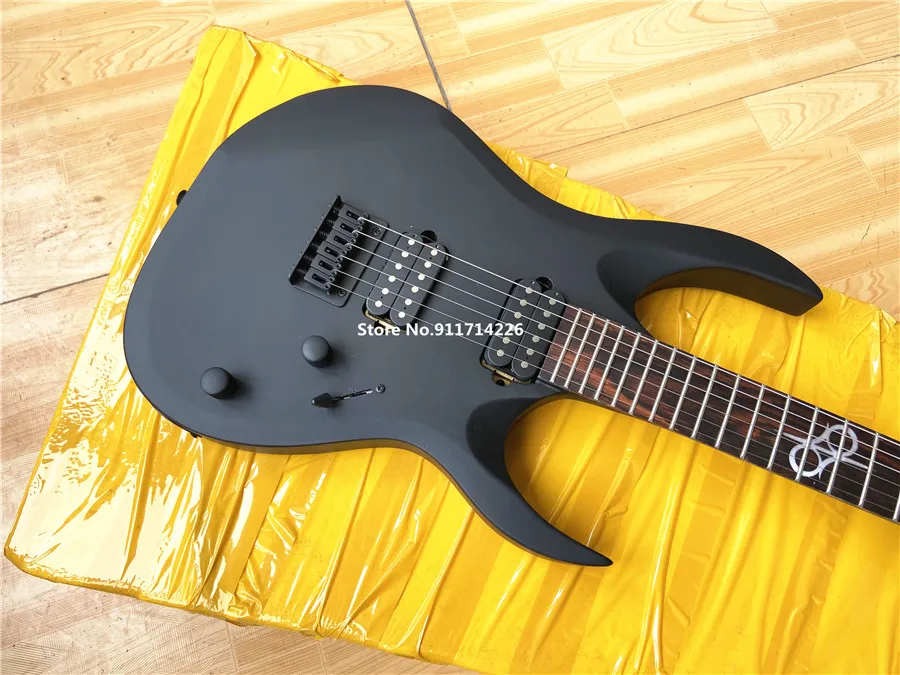 High quality customized version of the black dumb photoelectric guitar fixed body bridge can be customized