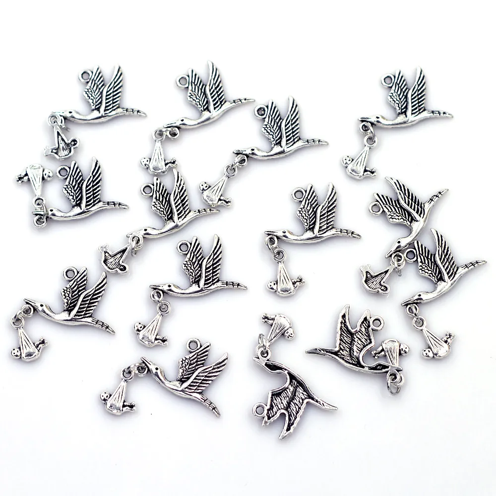 10Pcs Pendants Flying Stork Bird With Dangling Baby Silver Tone Jewelry DIY Findings Charms 17mm