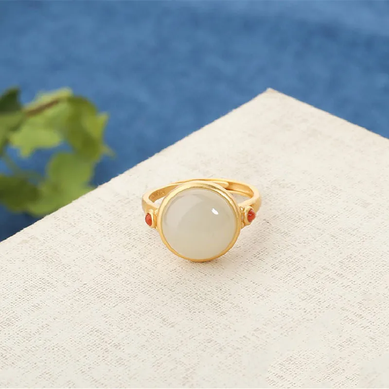 

The New S925 Sterling Silver Gold-Plated Inlaid Hetian Jade. South Red Agate Ring Personality Retro Temperament Ring Female