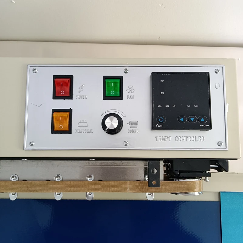 حار بيع آلة الختم المستمر للأكياس البلاستيكية مع آلة ختم الأكياس فيلم الحزام الناقل