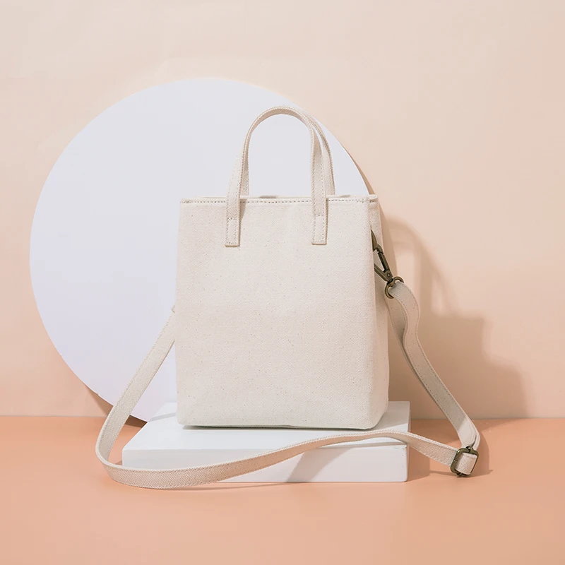 

Canvas bag 2020 new tide summer fashion trend messenger wild temperament small fresh small square bag