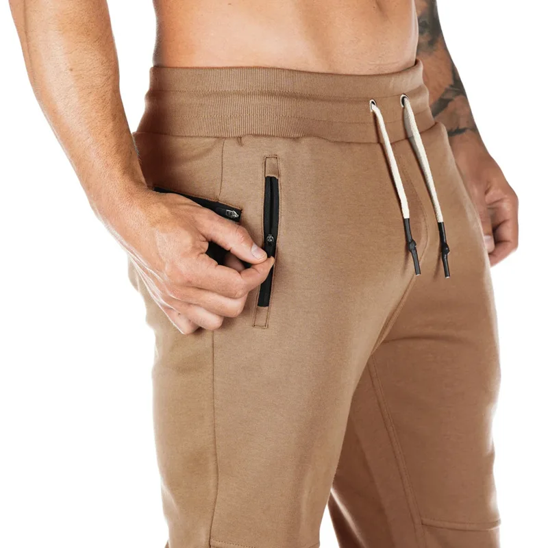 Pantaloni da jogging ad asciugatura rapida mimetici pantaloni sportivi da uomo pantaloni sportivi da Bodybuilding pantaloni da palestra pantaloni da