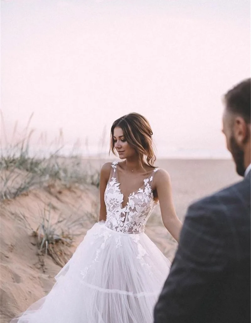 Abiti da sposa romantici della boemia abiti da sposa senza maniche in pizzo con scollo a v e fiori