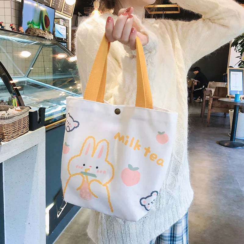 Bolso de compras pequeño con estampado de dibujos animados para mujer, Mini bolsas de lona portátiles, Lolita, estudiantes, Kawaii, moda, bolsas de almacenamiento, venta al por mayor