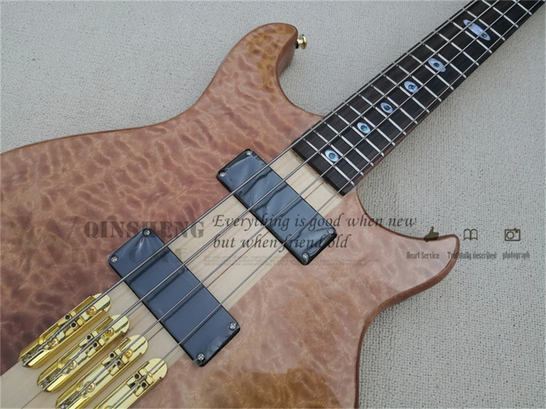 Custom 4 string bass guitar brown squilted maple veneer,mahogany body,gold buttons,active battery