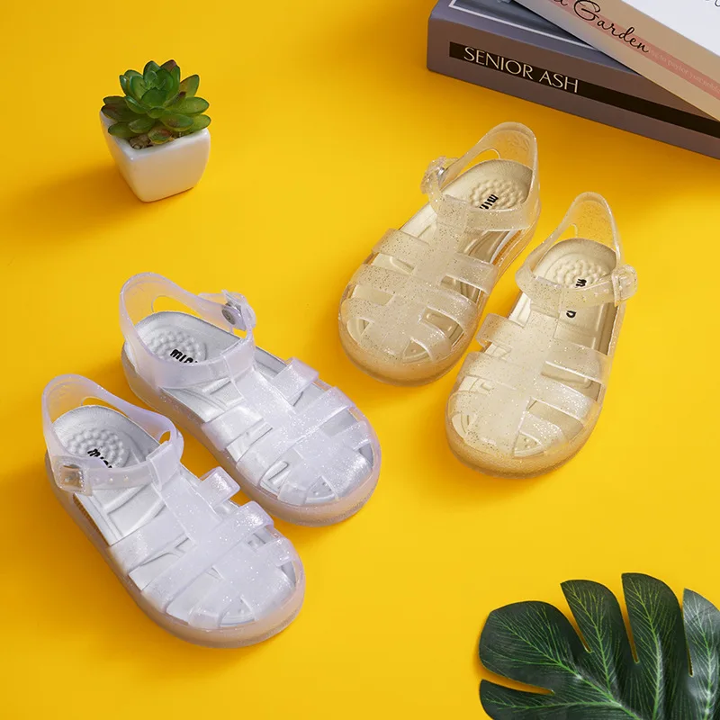 MINI DD Baby sandals 2022 summer new transparent PVC jelly shoes Princess Baotou children\'s Roman beach soft candy shoes DD007