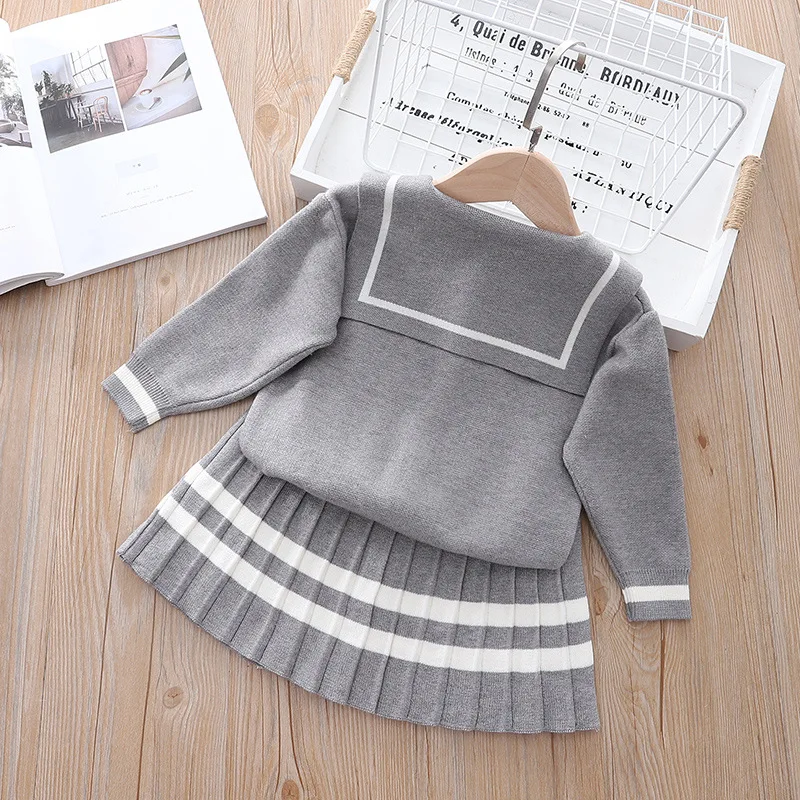 Autunno ragazza College Style maglione Set bambini coreano simpatico orso ricamato Cardigan gonna a pieghe scuola due pezzi Set