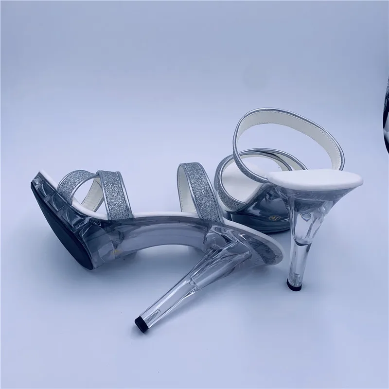 Models walk the stage in sexy silver sequined heels and nightclub chic 13cm high-heeled sandals