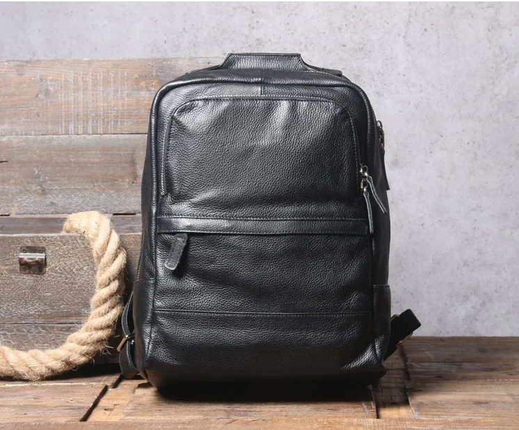 

Simple casual head leather men's backpack, handmade leather computer backpack, leather fashion bag