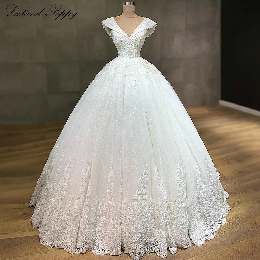 Lceland Poppy Customized V Neck Ball Gown Shiny Wedding Dresses Cap Sleeves Beaded Lace Appliques Bridal Gowns with Sweep Train