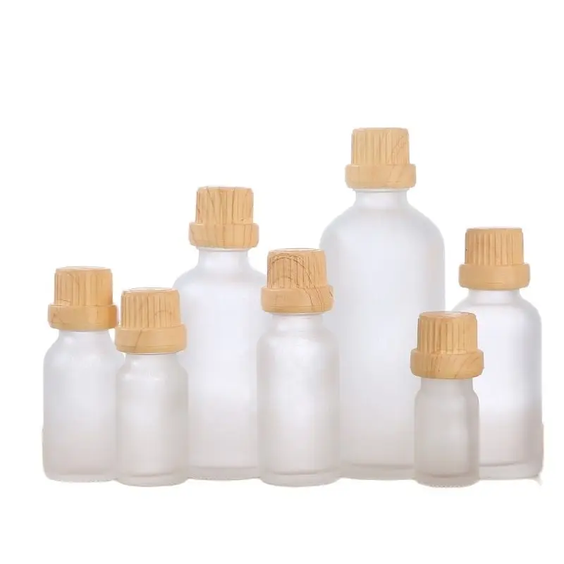 

15pcs Glass Bottle Frosted False Wood Lid 5ml10ml15ml20ml30ml50ml100ml Perfume Serum Cosmetic Refillable Essential Oil Vials