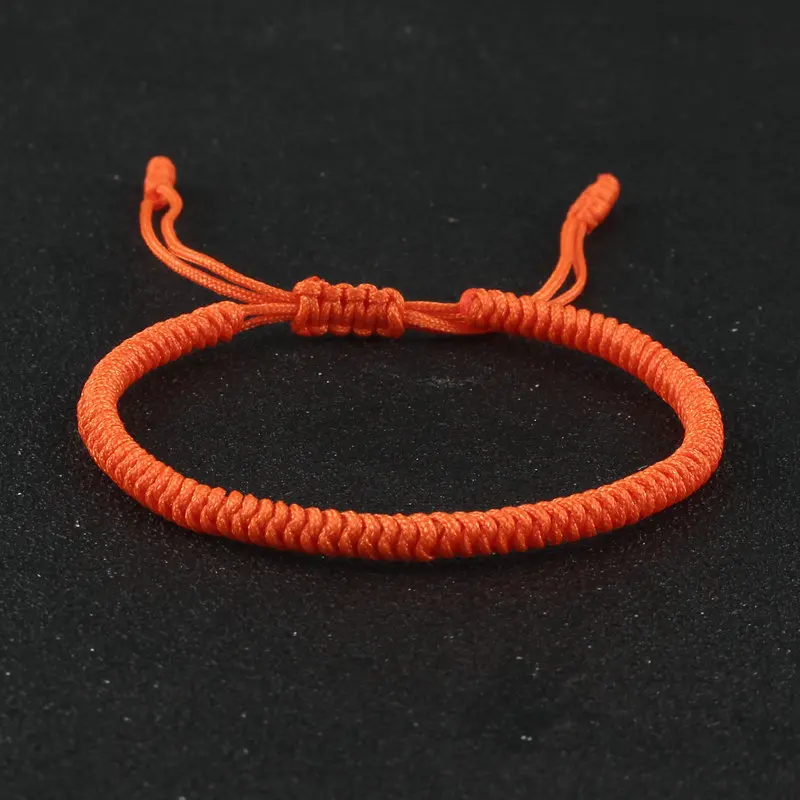 Handmade Braided Red Thread Bracelet with Knot Charm product image