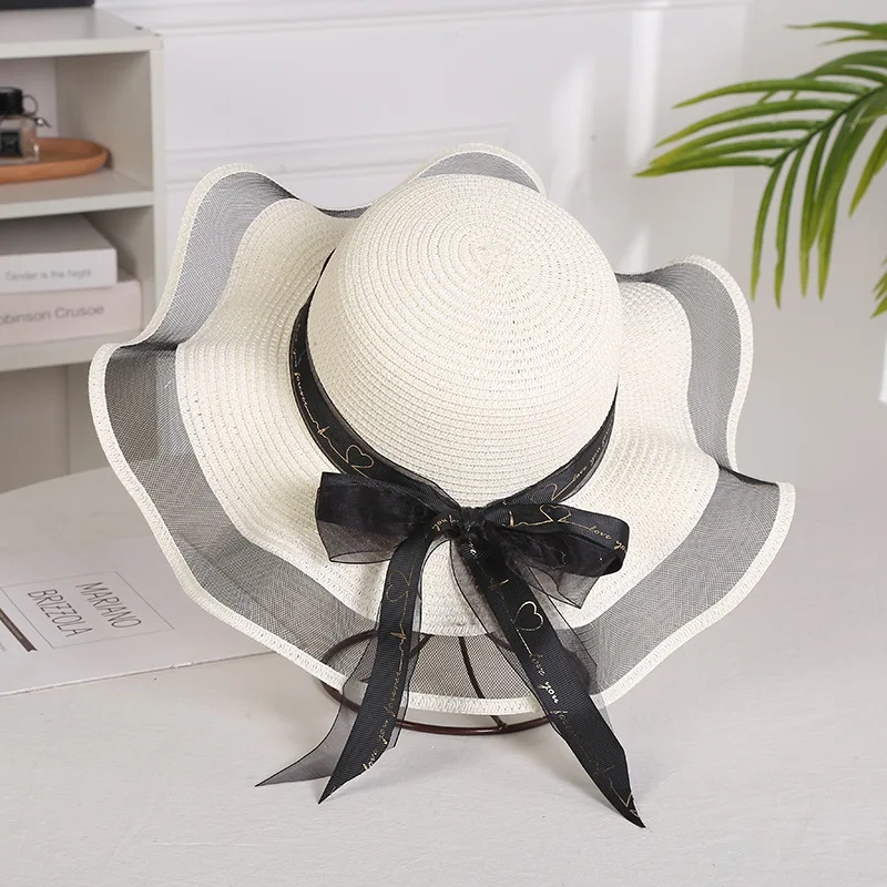 Sombrero plegable de paja con lazo para niña y mujer, sombrero de paja flexible con ala grande, elegante, protección contra la sombra, a la moda,