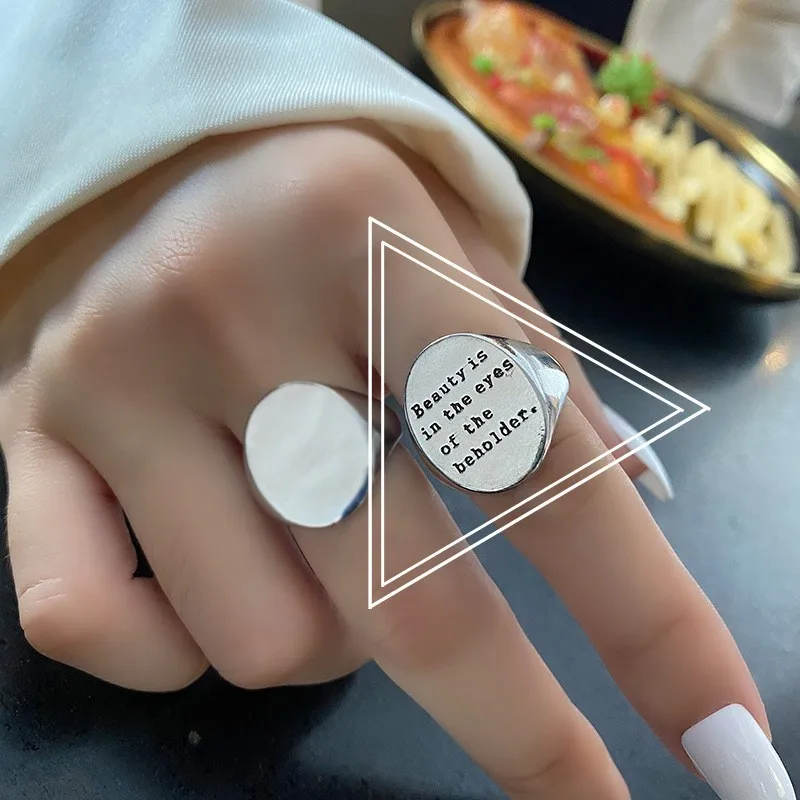 QMCOCO Korean Silver Color Ring Woman Simple Personality Wide Oval Smooth English Letter Student Exquisite Index Finger Ring