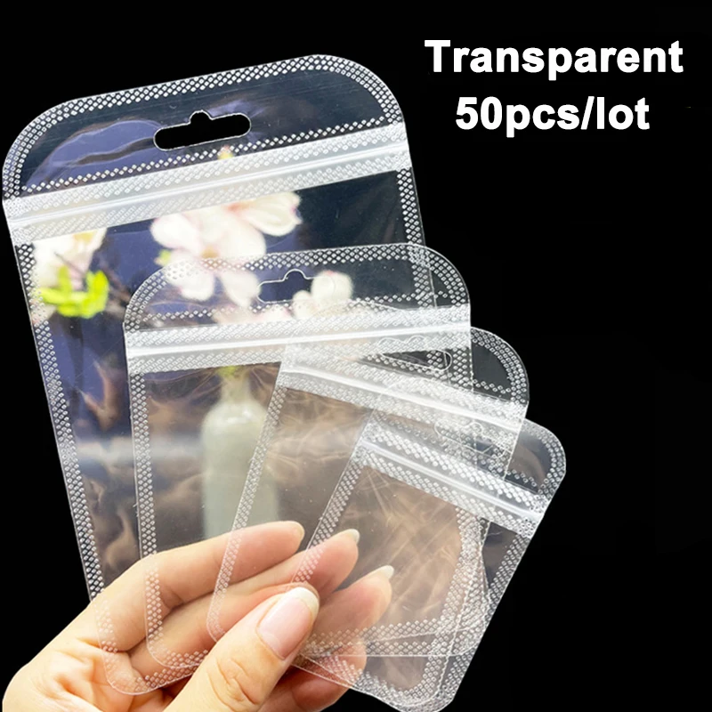 50 stücke Kleine Kunststoff Taschen 7*11cm 8.5*13cm Transparent Ziplock Tasche mit Loch Ohrring Halskette schmuck Zubehör Lagerung Display