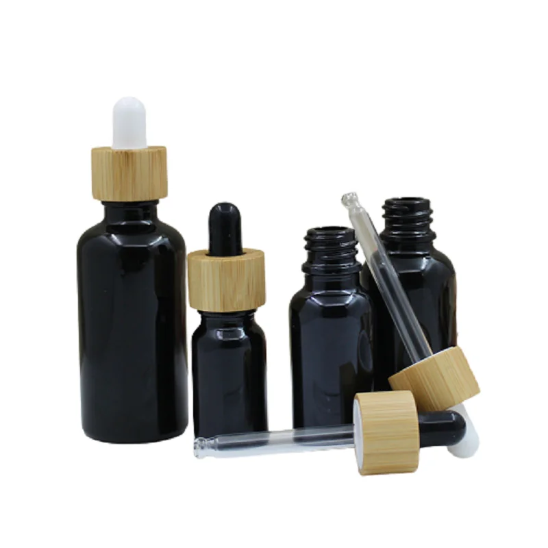 

15pcs Shiny Black Glass Refillable Bottle Bamboo Wood Ring Empty Essential Oil Dropper Vials 5ml 10ml 15ml 20ml 30ml 50ml 100ml