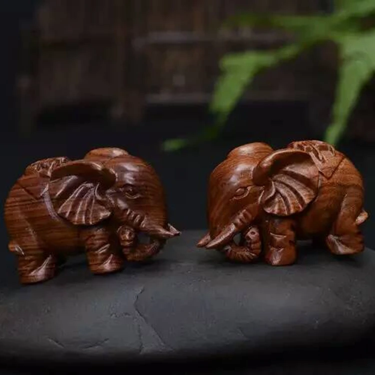 Natural red wood acid wood carving, riches and fortune, money, elephant carving, wooden carving ornaments, decorative crafts.