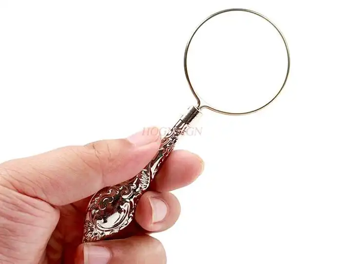 magnifying equipment Magnifying glass portable handheld optical glass old man looking at mobile phone magnifying