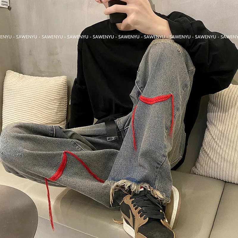 

Jeans men's autumn trend versatile raw edge design loose straight pants high street ruffian handsome wide leg pants